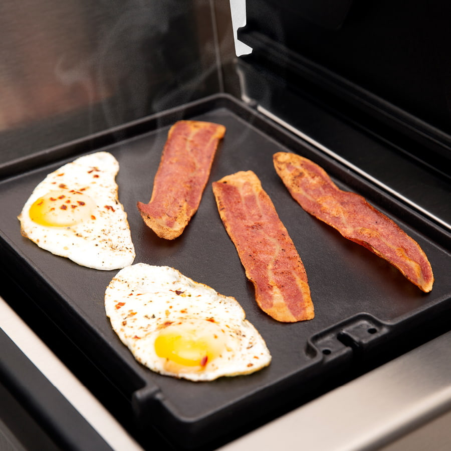 Plaque réversible en fonte pour brûleur latéral